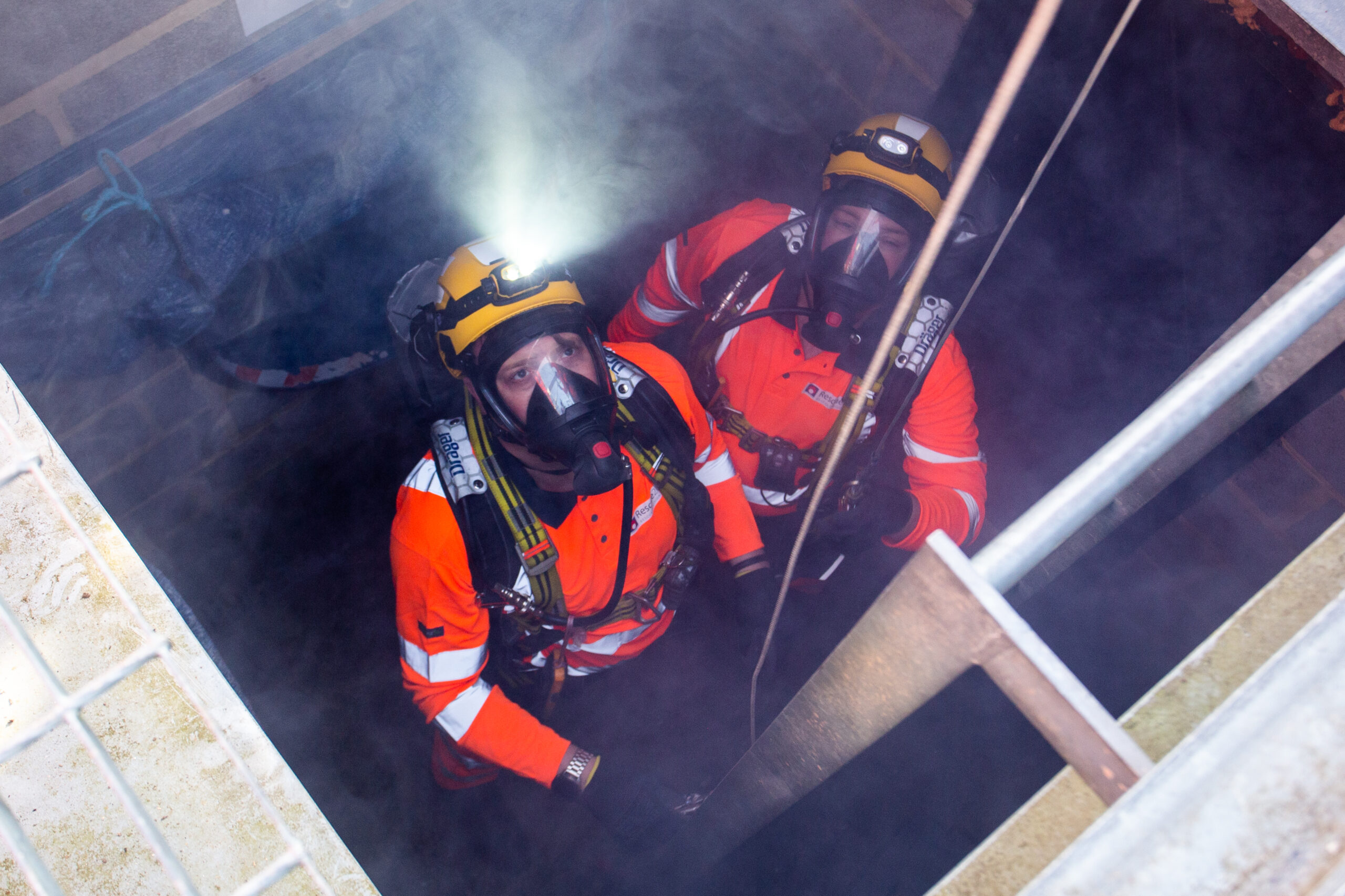 Two Confined Space Technicians in enclosed space